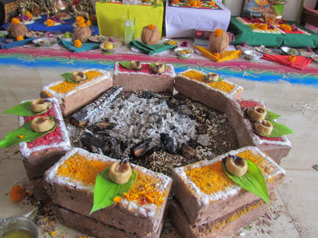 A fire place with burnt ash in the middle used for Hindu religious ceremoniesの写真素材
