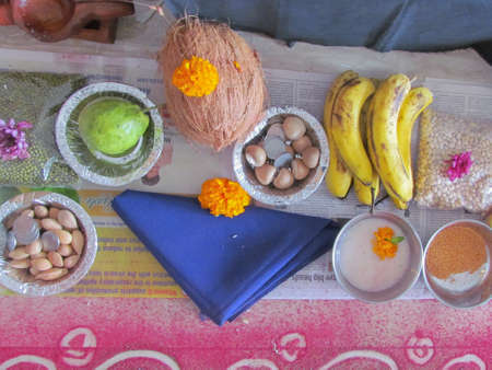 Fruits and other ingredients kept as offerings before prayer as per Hindu ritualの写真素材