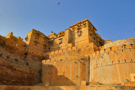 Front view of Jaisalmer fort taken from low angle with blue sky on horizon at Jaisalmer, India on 19 February 2018のeditorial素材