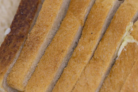 Close up Macro image of Slices of freshly baked bread kept on plate