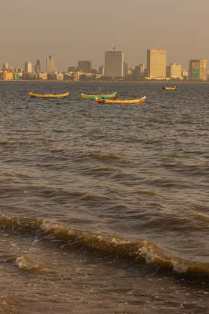 A view of the Mumbai skyline of Nariman point from marine drive beach at Mumbai India on 2 April 2021のeditorial素材