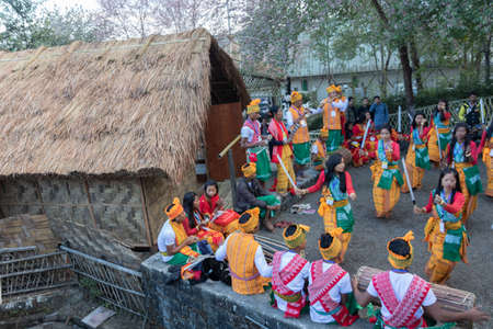 Traditional Manipuri dance being performed by women of Manipur wearing their ethnic dress during Hornbill Festival in Nagaland India during hornbill festival on 4 December 2016のeditorial素材