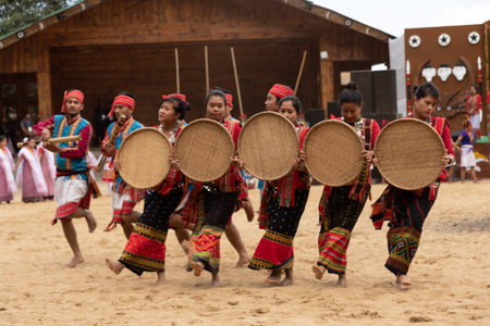 Selective focus image of Tribal dance of North East India being performed during Hornbill Festival at Nagaland India on  2 December 2016のeditorial素材