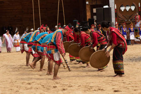 Selective focus image of Tribal dance of North East India being performed during Hornbill Festival at Nagaland India on  2 December 2016のeditorial素材