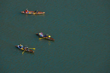 Ariel view of Tourists siting on row boats in a lake at Nainital India on 2 January 2022のeditorial素材