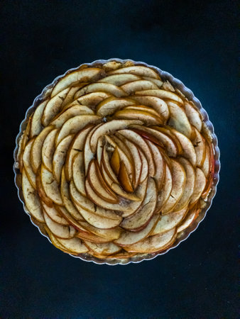 Apple pie on a dark background. Top view. Flat lay.の写真素材