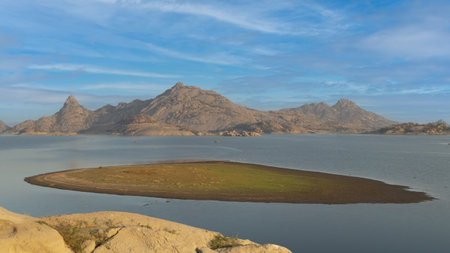 Panoramic view of the lake and mountains in the background.の写真素材