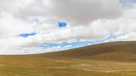 Grassland in the Mongolian steppe against the blue skyの写真素材