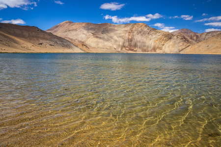 Ripples in clear water of Yayatso, a high-altitude lake at Ladakh, India. A new biodiversity hotspot at an altitude of 4820 meters.の写真素材