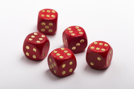 Five dice, all sixes isolated on a white backgroundの写真素材