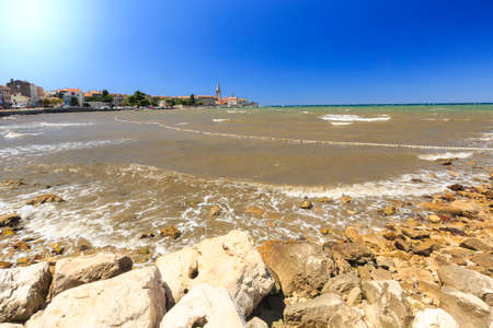 Skyline of the Istrian village Porec, Croatia on the Adriatic sea region. Porec is a popular, travel and touristic destination.の写真素材