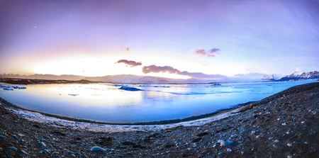 Jokulsarlon glacier lake in Iceland during sunset in Winter season. The lake is growing every year...