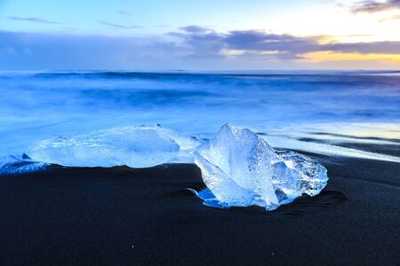Jokulsarlon glacier lake in Iceland during sunset in Winter season. The lake is growing every year...