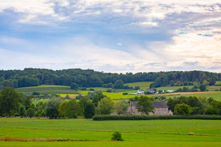 Best of Limburg landscape sunset, beautiful green scenery, hills, fields and meadow, vegetation and villageの写真素材