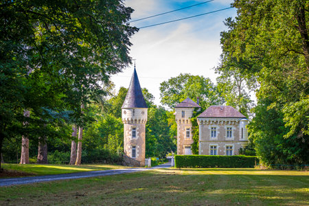 A small, hidden, picturesque castle oa sunny day in a dreamlike landscape on farmland.のeditorial素材