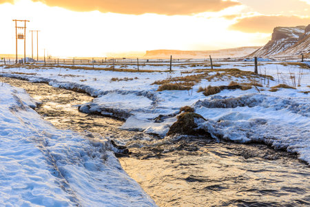 South Iceland Route 1 road snowy Winter during sunset and dramatic sky and landscape.の写真素材