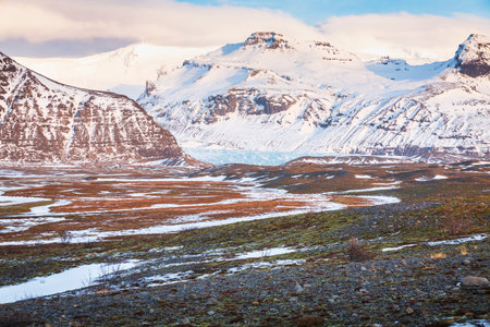 South Iceland Route 1 road snowy Winter during sunset and dramatic sky and landscape.の写真素材