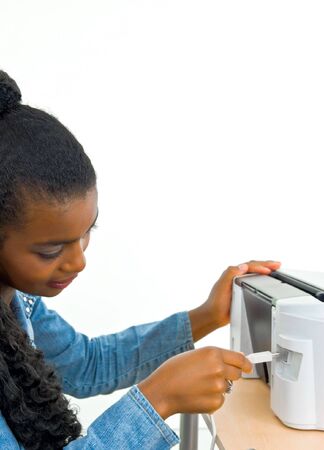 elegant office girl inserting a cable