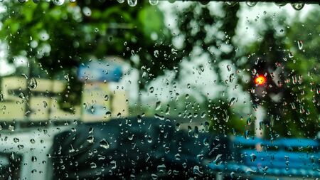Rain drops fall on the windshield.の写真素材