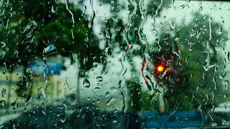Rain drops fall on the windshield.の写真素材