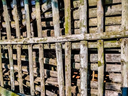 Lighted old bamboo fence in the rural area in india.の写真素材