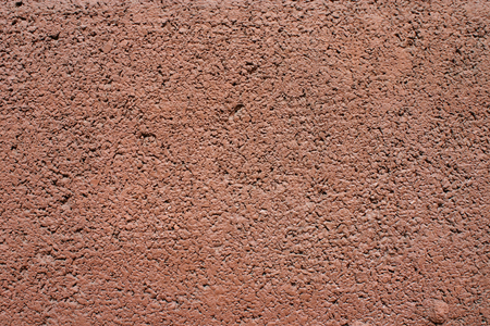 Texture of the old red paint on a small area of the surfaceの写真素材