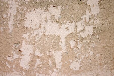 Texture of the old pink paint on a small area of the surfaceの写真素材