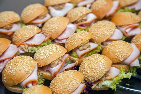 hamburger with bacon and herbs in several rowsの写真素材