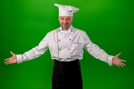 white middle-aged man on a green backgroundの写真素材