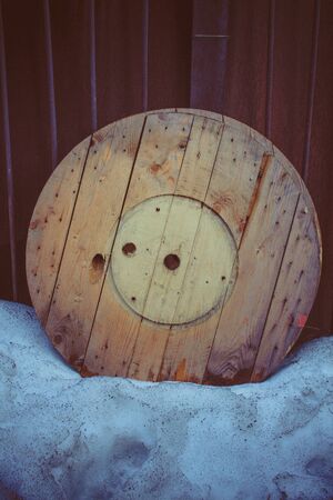 Wheel of wooden electric wireの写真素材