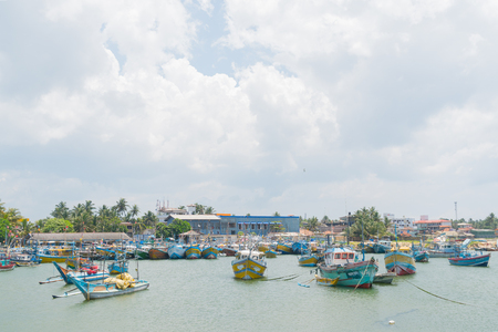 March 2, 2018. Hikkaduwa, Sri Lanka. Wooden fishing boats on the shore.のeditorial素材
