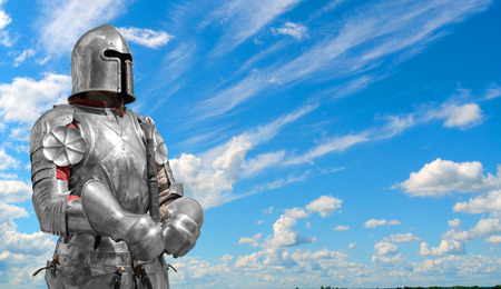 Knight in helmet and metal armor.の写真素材