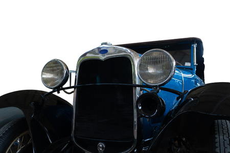 Old, vintage car with chrome headlights.の写真素材