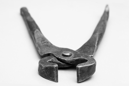 Tools for pulling nails - old metal pliers.の写真素材
