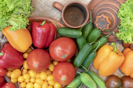 Tomatoes, cucumbers, salad and sweet Bulgarian pepper. Top view.の写真素材