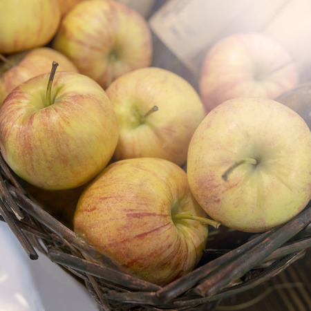 Ripe apples in a basket.の写真素材