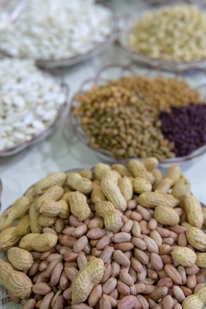 Peanuts in shell and peeled.の写真素材