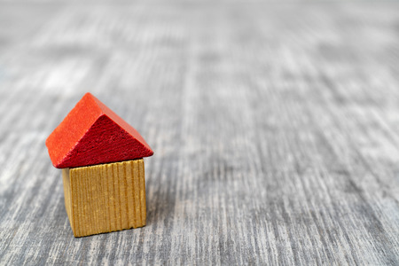 Red roof wooden toy house.の写真素材