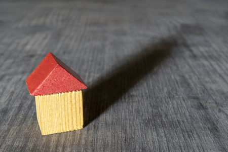 Red roof wooden toy house.の写真素材