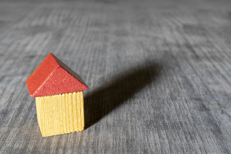 Red roof wooden toy house.の写真素材