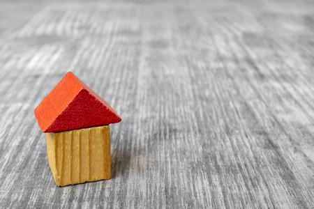 Red roof wooden toy house.の写真素材