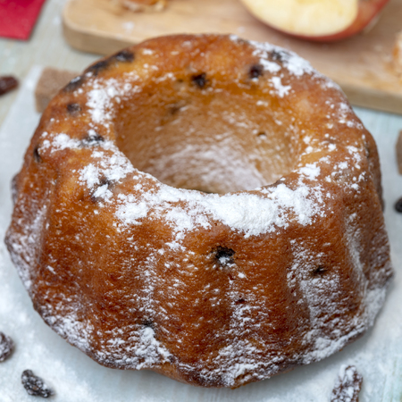 Fresh baked delicious homemade cake with tangerines, raisins. Holiday for the whole family.の写真素材
