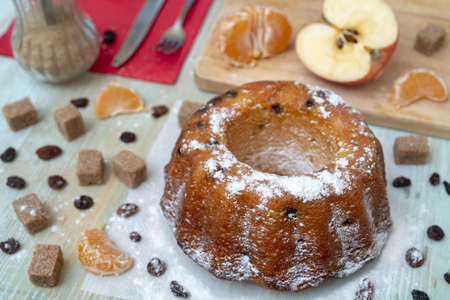 Fresh baked delicious homemade cake with tangerines, raisins. Holiday for the whole family.の写真素材