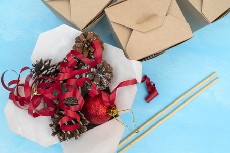 Christmas gifts in WOK paper packaging boxes. For Asian fast foods.の写真素材
