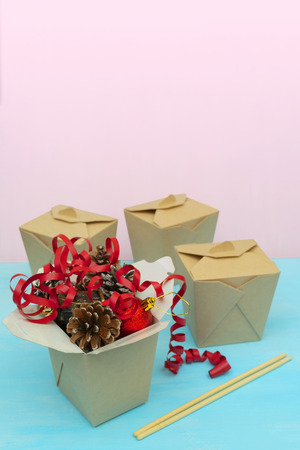 Christmas gifts in WOK paper packaging boxes. For Asian fast foods.の写真素材