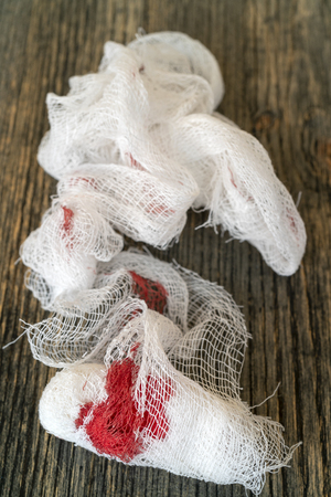 Red blood on a white bandage.の写真素材