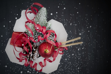 Christmas gifts in WOK paper packaging boxes. For Asian fast foods.の写真素材