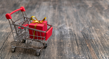 Red gift box in the basket.の写真素材