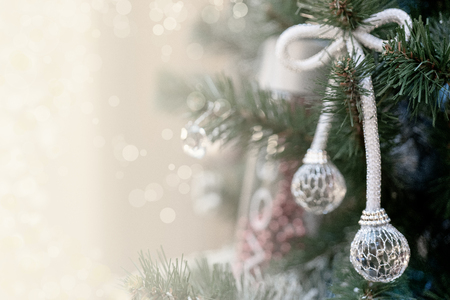Christmas background - branches, toys, highlights. Place for congratulations.の写真素材
