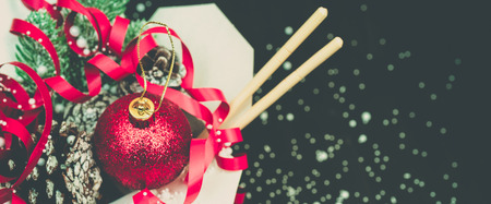 Christmas gifts in WOK paper packaging boxes. For Asian fast foods.の写真素材